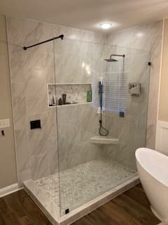 Frameless Panel with Support Bar - Frameless Showers project by Custom Glass Works