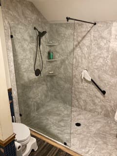 PanelandSupportBar - Frameless Showers project by Custom Glass Works