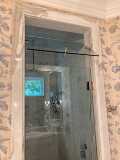 Transom - Frameless Showers project by Custom Glass Works