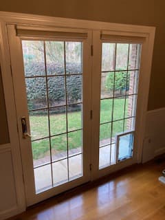Pet Door in Stationary French Door with Grids - Pet Doors project by Custom Glass Works